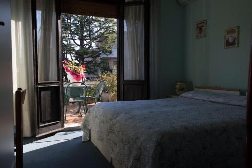 Posteľ alebo postele v izbe v ubytovaní Hotel Primavera