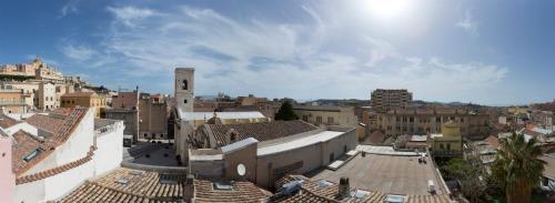 an aerial view of a city with buildings at MYO Cagliari Charming House in Cagliari