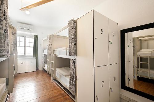 Ένα ή περισσότερα κρεβάτια σε δωμάτιο στο Goodmorning Solo Traveller Hostel