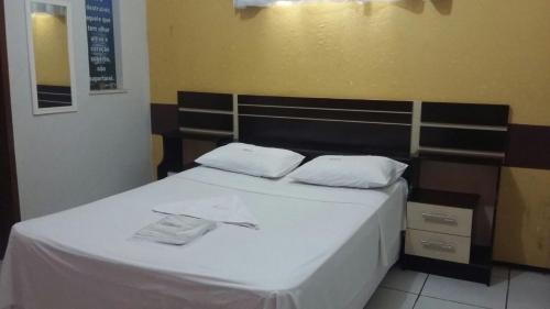 Postel nebo postele na pokoji v ubytování Hotel São Francisco