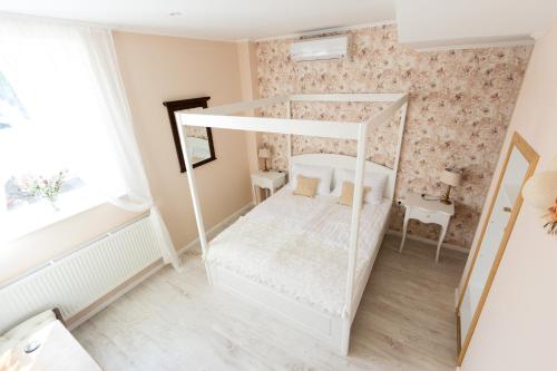 Letto o letti in una camera di Villa Harmónia