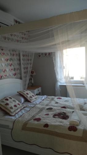 Letto o letti in una camera di Villa Harmónia