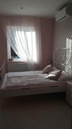 Letto o letti in una camera di Villa Harmónia