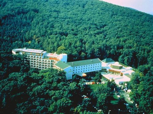 an aerial view of a building on a mountain at Hotel Lövér Sopron in Sopron
