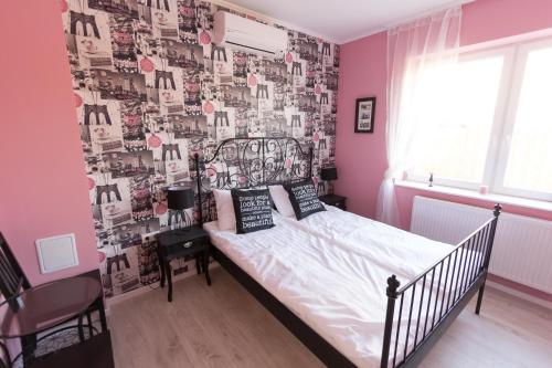 Letto o letti in una camera di Villa Harmónia