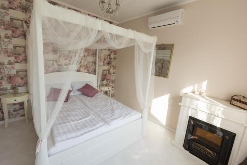 Letto o letti in una camera di Villa Harmónia