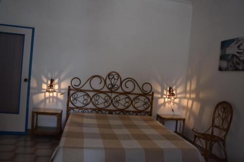 Una cama o camas en una habitación de Villetta Generosa