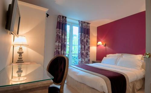 Кровать или кровати в номере Hotel Cluny Square