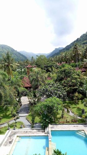 an aerial view of a resort with two pools at Villa Campi Sorga in Senggigi 