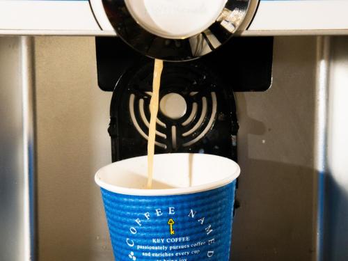 a drink being poured into a coffee cup at Hotel Abest Nagano Ekimae in Nagano