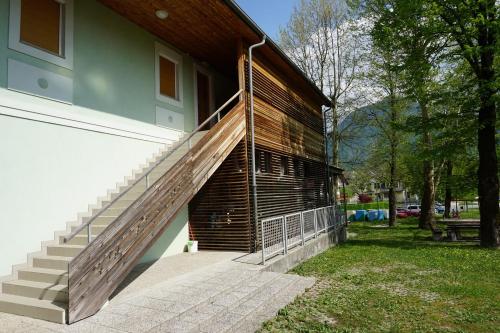 a staircase leading to the side of a building at Krona Apartments in Bovec