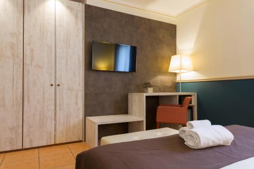 Hotel Ponte di Rialtoにあるベッド