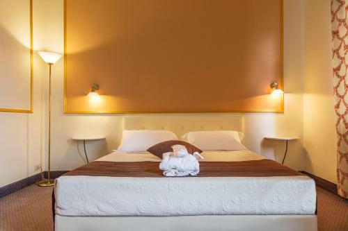 Hotel Ponte di Rialtoにあるベッド