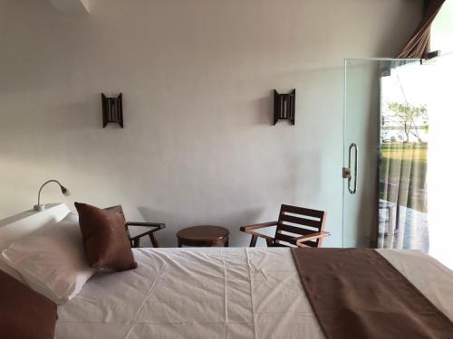 Postel nebo postele na pokoji v ubytování Ypsylon Resort Ostküste