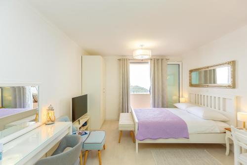 Posteľ alebo postele v izbe v ubytovaní Dubrovnik Colors - Old Town View Apartment No3