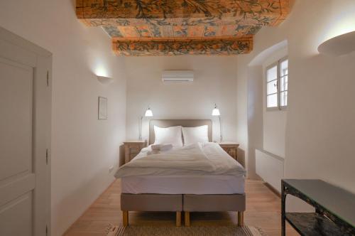 Postel nebo postele na pokoji v ubytování 18th CENTURY BAROQUE RESIDENCE