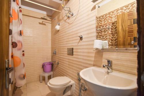 Vannas istaba naktsmītnē Dhanlaxmi Apartments