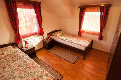 Katil atau katil-katil dalam bilik di Apartment House Sumrak