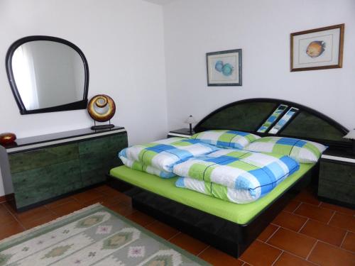 Postel nebo postele na pokoji v ubytování Villa Banfi