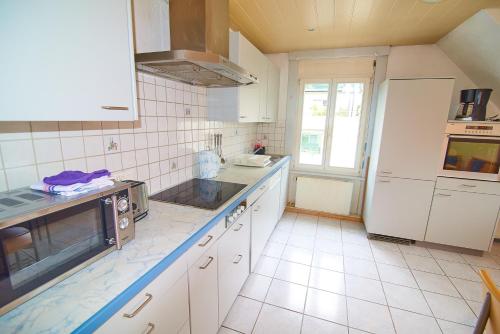 Dapur atau dapur kecil di Residence Villa Flora