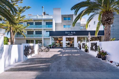 a building with a sign that reads bahari hotel at Bel Air in Castelldefels