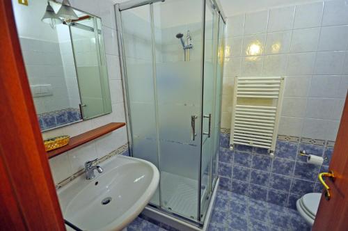 Ванная комната в Erba Di Campo Residence