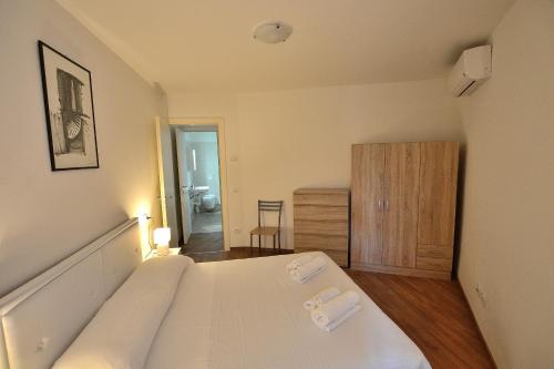 Postel nebo postele na pokoji v ubytování Apartment Del Pescatore