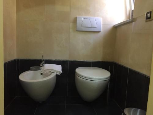 Bilik mandi di Seaside Apartment
