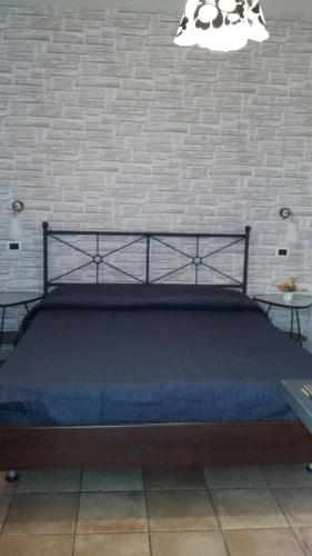 Giường trong phòng chung tại B&B Dolcevita