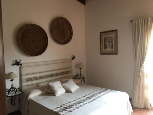 Llit o llits en una habitació de Le Pavoncelle di Stintino