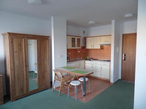 Η κουζίνα ή μικρή κουζίνα στο Apartamenty Twoje Mikołajki