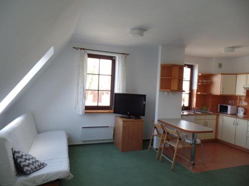 Η κουζίνα ή μικρή κουζίνα στο Apartamenty Twoje Mikołajki