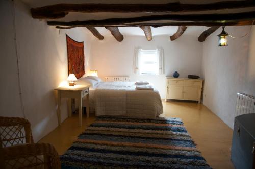 A bed or beds in a room at Casa Josefa
