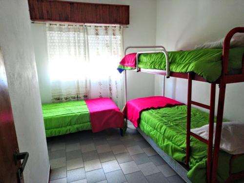 Postel nebo postele na pokoji v ubytování Complejo AleMar