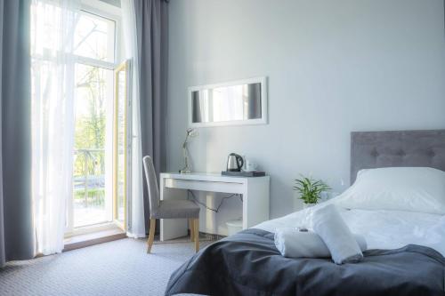 Un ou plusieurs lits dans un hébergement de l'établissement Hotel Inner City