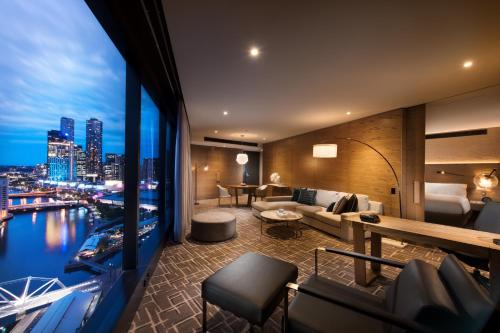 a hotel room with a view of a city at Pan Pacific Melbourne in Melbourne
