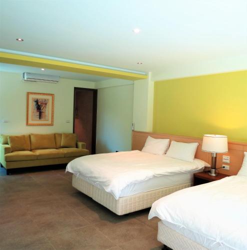 Cama o camas de una habitación en Spring Land Villa & 白舍青丘