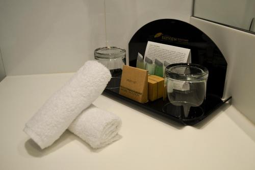 a roll of paper towels sitting on a counter at The Sydney Boulevard Hotel in Sydney