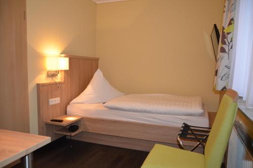 Hotel Sassorにあるベッド