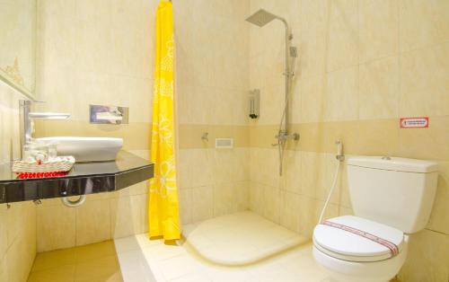 Ett badrum på Zamzam Hotel and Resort