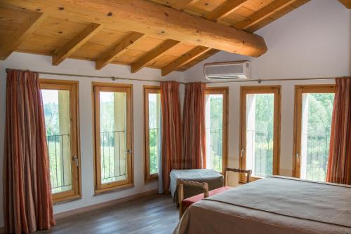 Postel nebo postele na pokoji v ubytování Cascina Girolda