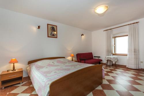Postel nebo postele na pokoji v ubytování Nilda 2