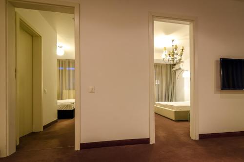Apart Hotel Vlad Tepesにあるベッド