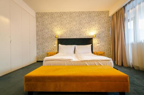 Apart Hotel Vlad Tepesにあるベッド