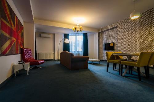Apart Hotel Vlad Tepesにあるテレビまたはエンターテインメントセンター