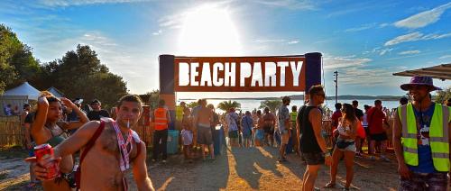 a crowd of people standing around a sign at aestival at Apartment Carmen in Pula