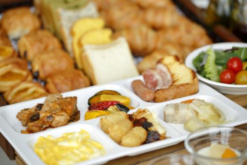 a plate of food with different types of food at Hotel Monterey Himeji in Himeji