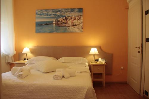 Ένα ή περισσότερα κρεβάτια σε δωμάτιο στο Hotel Argentina