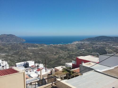 a view of the ocean from a building at Karpathos house in Menetaí