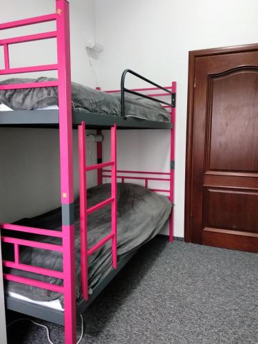 Postel nebo postele na pokoji v ubytování Rodmos Hostel